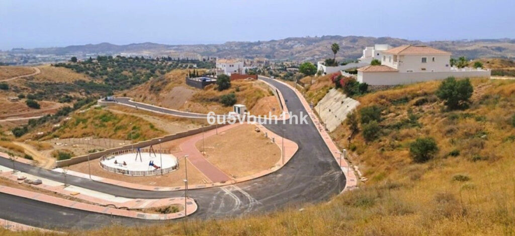 Kavel in Mijas met panoramisch zee- en bergzicht in Mijas - hoofdfoto